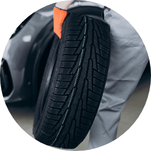 mechanic changing tires car service