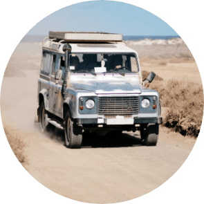 vertical off road car moving desert road